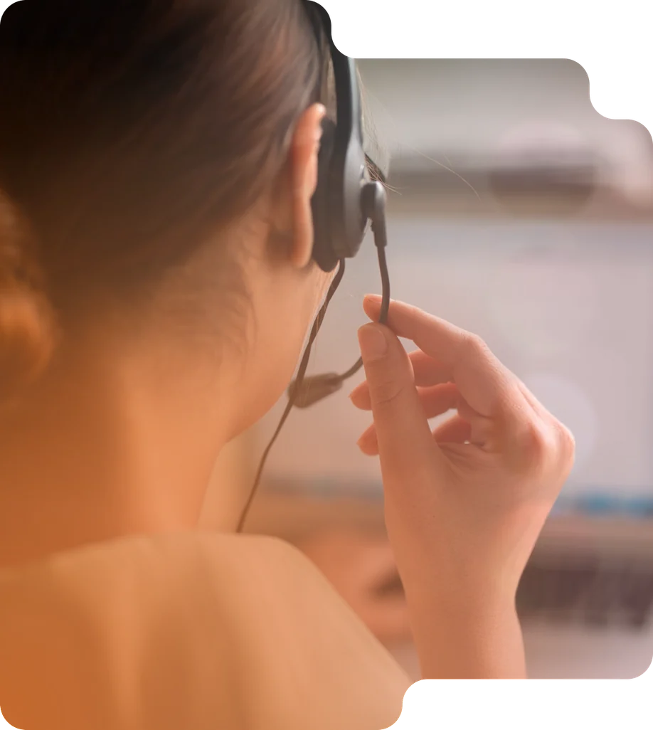 Smartmend customer service agent wearing a headset.